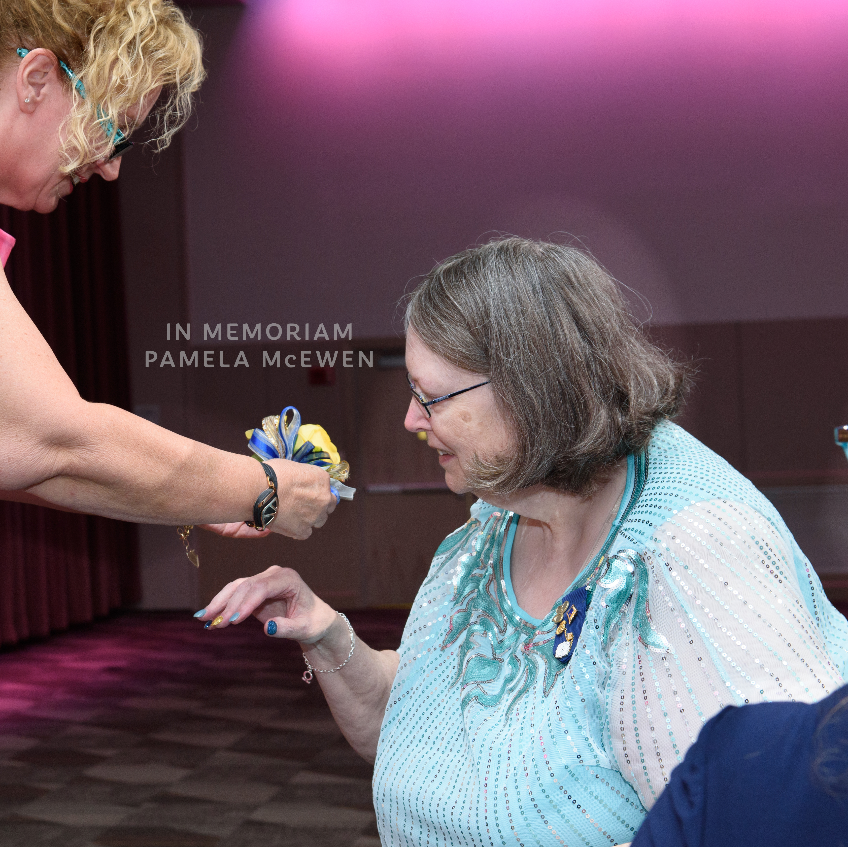 Pamela McEwen receives yellow rose corsage at Convention 2017