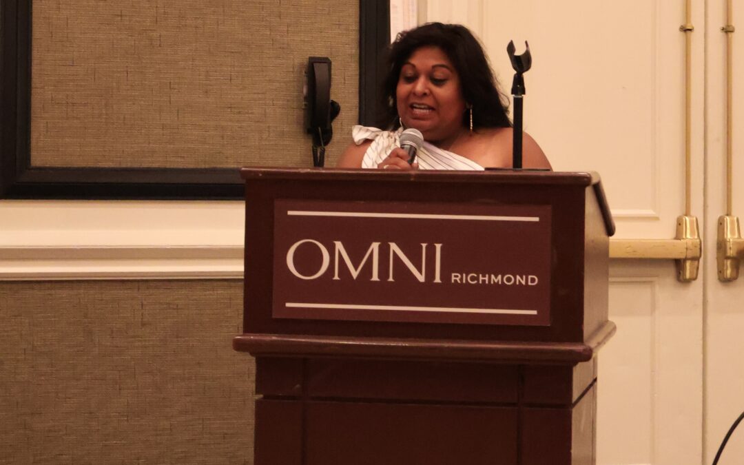 National President standing at podium